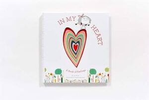 Book cover of ‘In My Heart: Book of Feelings’ by Jo Witek and Christine Roussey, featuring a cutout heart design with multiple colourful layers and whimsical illustrations.