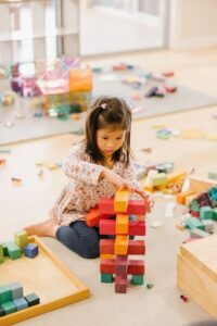 A grade-schooler playing Grimm's Large stepped pyramid