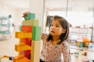 A grade school child playing Grimm's Large stepped pyrmaid